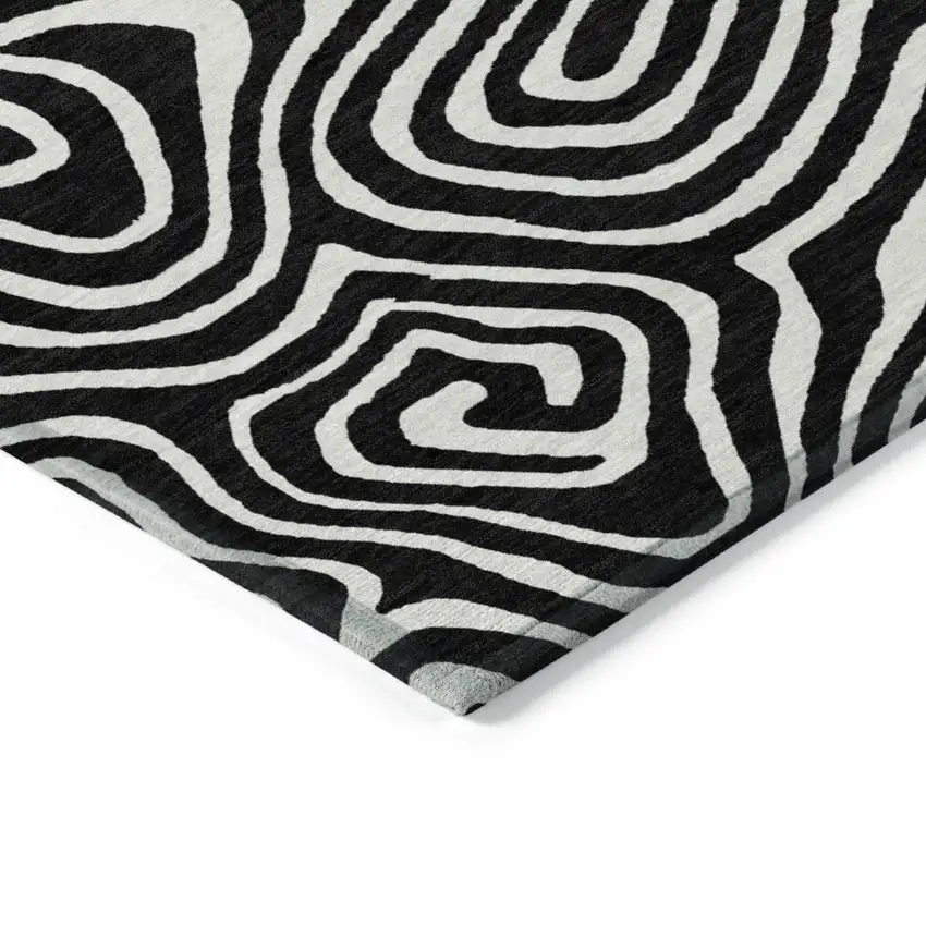 Black And Ivory Abstract Washable Indoor Outdoor Area Rug Photo 5