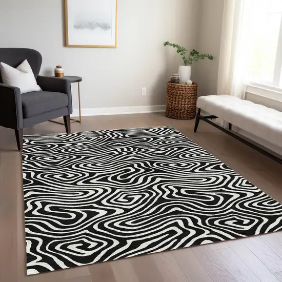 Black And Ivory Abstract Washable Indoor Outdoor Area Rug Photo 9