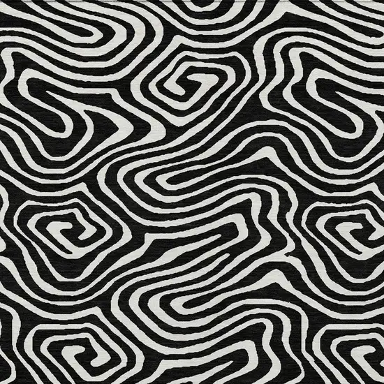 Black And Ivory Abstract Washable Indoor Outdoor Area Rug Photo 6