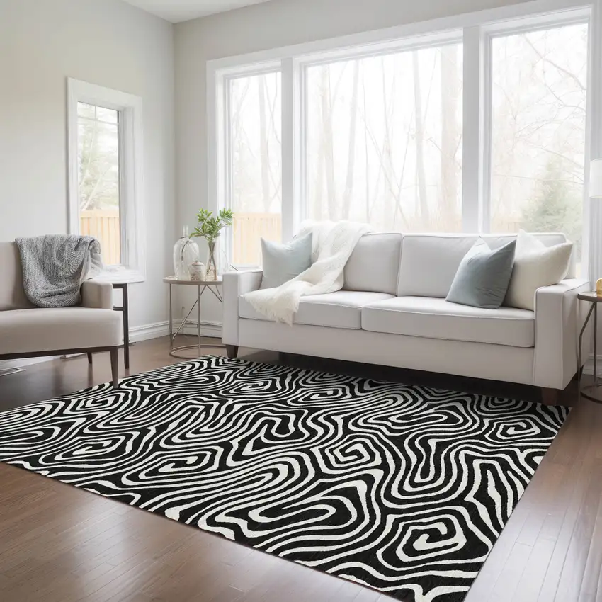 Black And Ivory Abstract Washable Indoor Outdoor Area Rug Photo 9