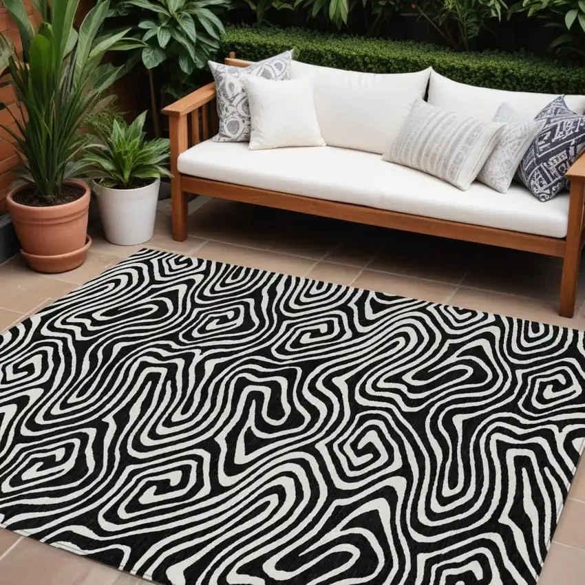Black And Ivory Abstract Washable Indoor Outdoor Area Rug Photo 1