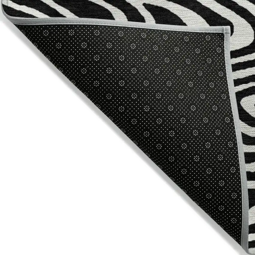 Black And Ivory Abstract Washable Indoor Outdoor Area Rug Photo 4