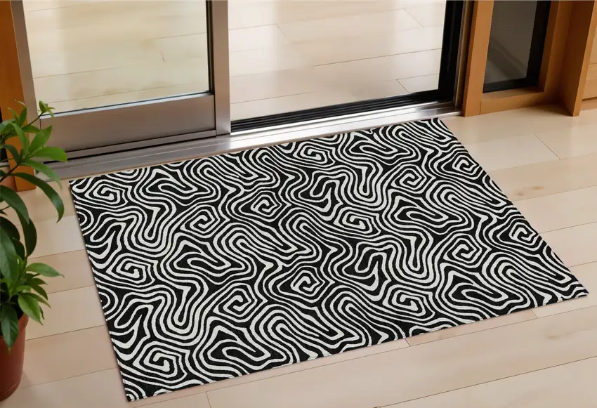 Black And Ivory Abstract Washable Indoor Outdoor Area Rug Photo 1