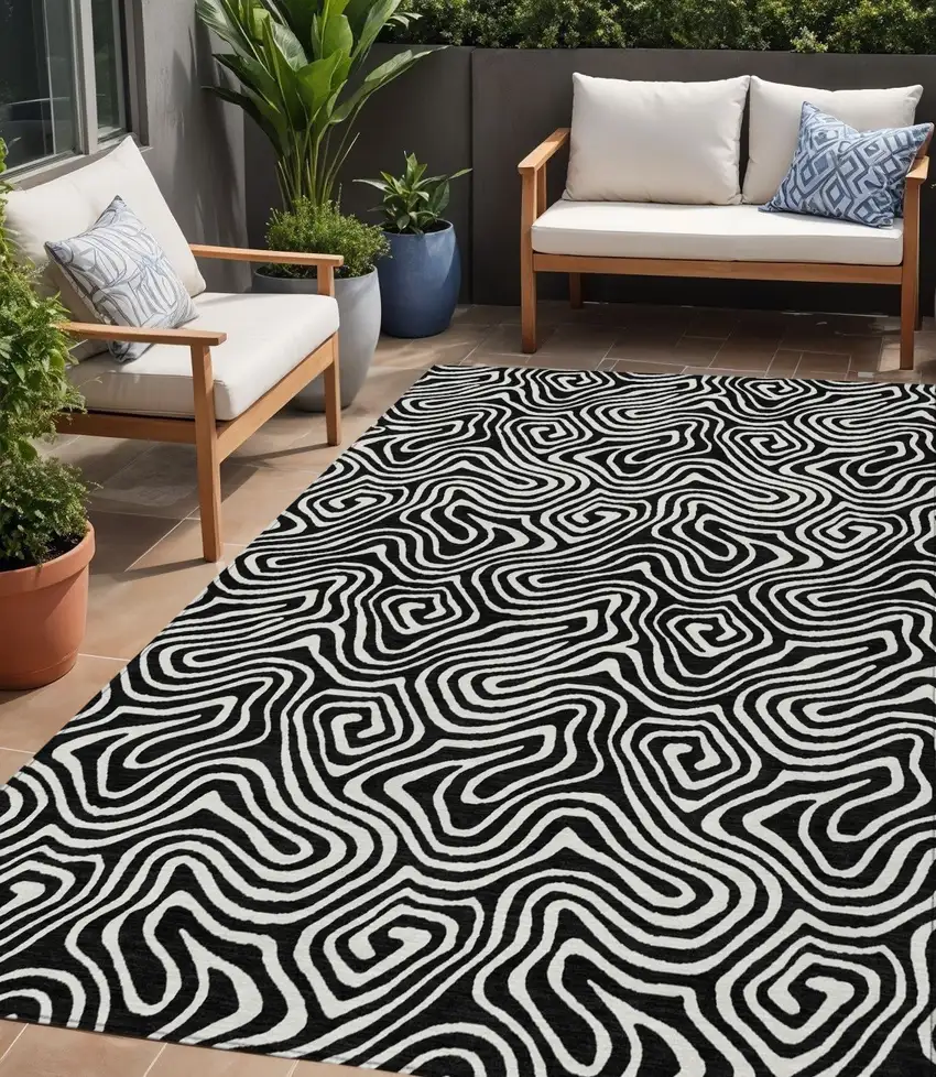 Black And Ivory Abstract Washable Indoor Outdoor Area Rug Photo 1