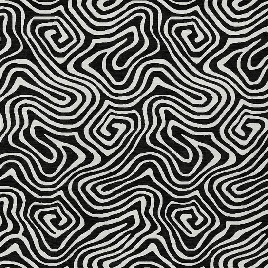 Black And Ivory Abstract Washable Indoor Outdoor Area Rug Photo 4
