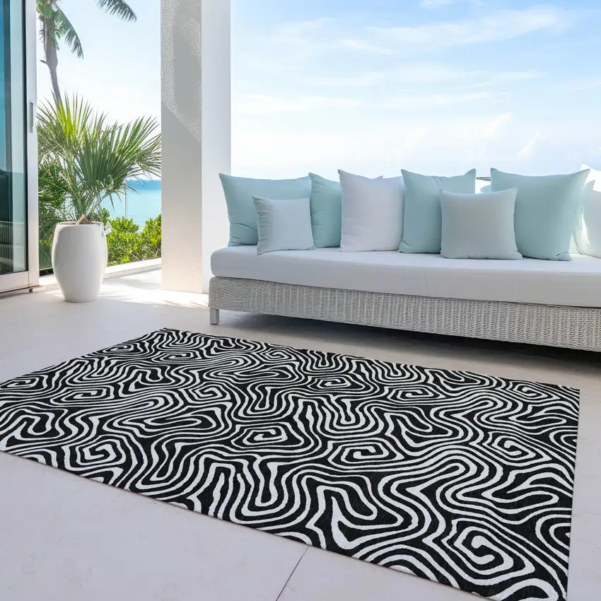Black And Ivory Abstract Washable Indoor Outdoor Area Rug Photo 9