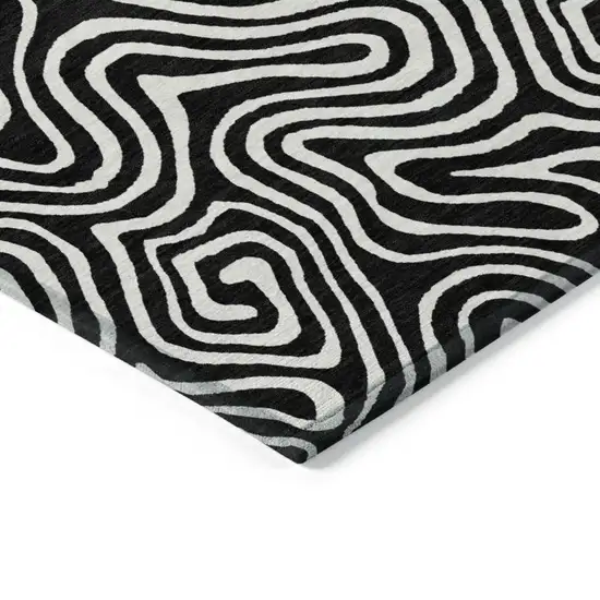 Black And Ivory Abstract Washable Indoor Outdoor Area Rug Photo 5