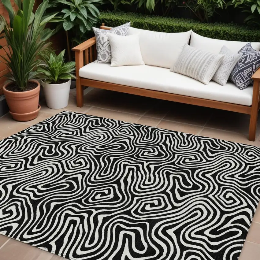 Black And Ivory Abstract Washable Indoor Outdoor Area Rug Photo 1