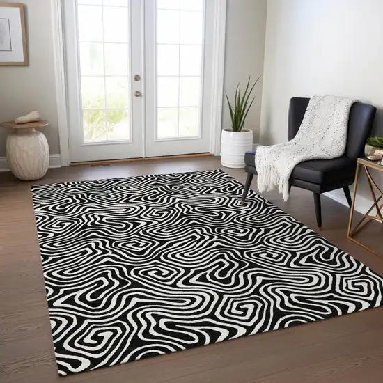 Black And Ivory Abstract Washable Indoor Outdoor Area Rug Photo 9