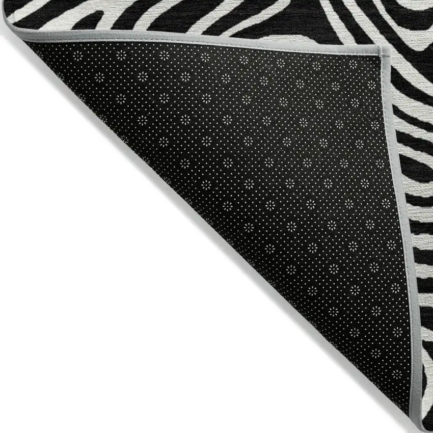 Black And Ivory Abstract Washable Indoor Outdoor Area Rug Photo 4