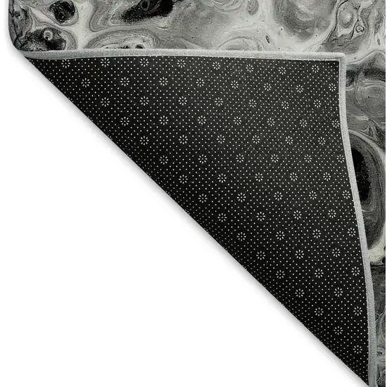 Black And Ivory Abstract Washable Indoor Outdoor Area Rug Photo 6