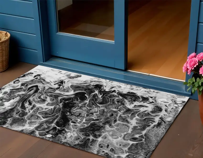 Black And Ivory Abstract Washable Indoor Outdoor Area Rug Photo 1