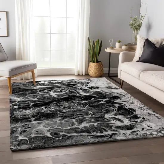 Black And Ivory Abstract Washable Indoor Outdoor Area Rug Photo 7
