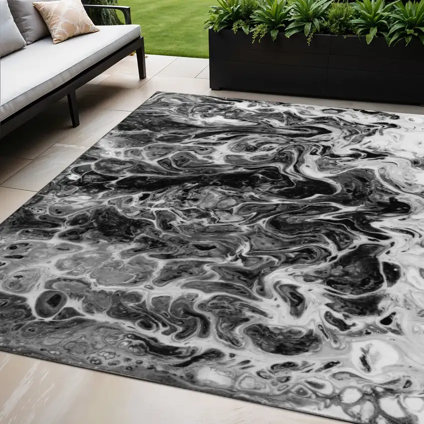 Black And Ivory Abstract Washable Indoor Outdoor Area Rug Photo 1