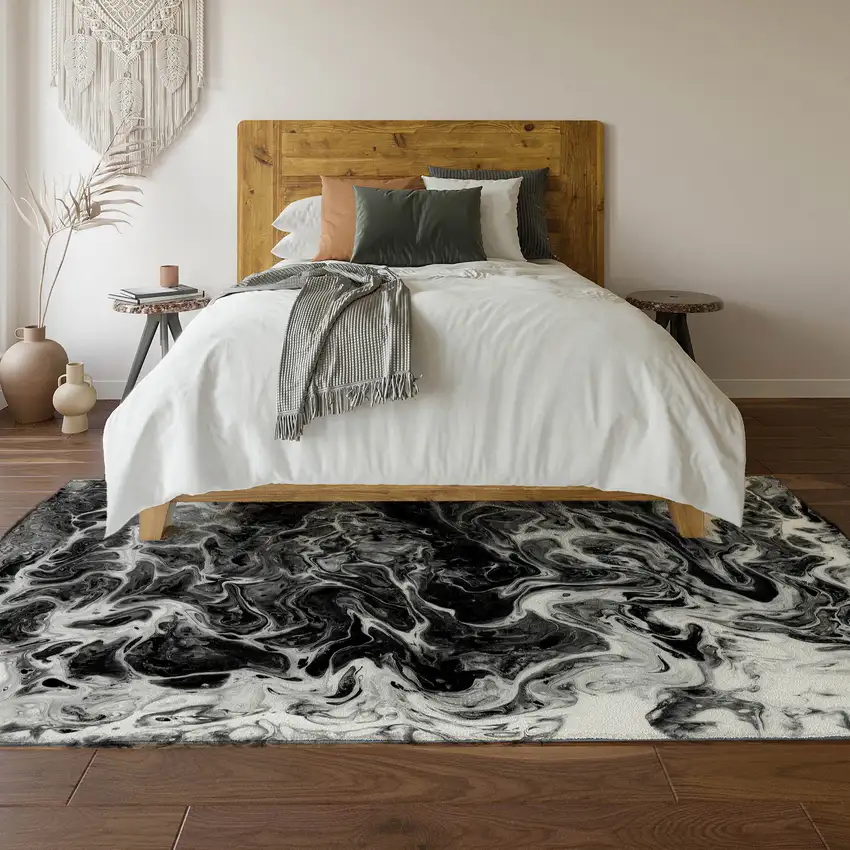 Black And Ivory Abstract Washable Indoor Outdoor Area Rug Photo 5