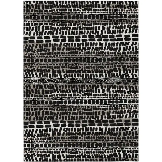 Black And Ivory Abstract Washable Indoor Outdoor Area Rug Photo 1