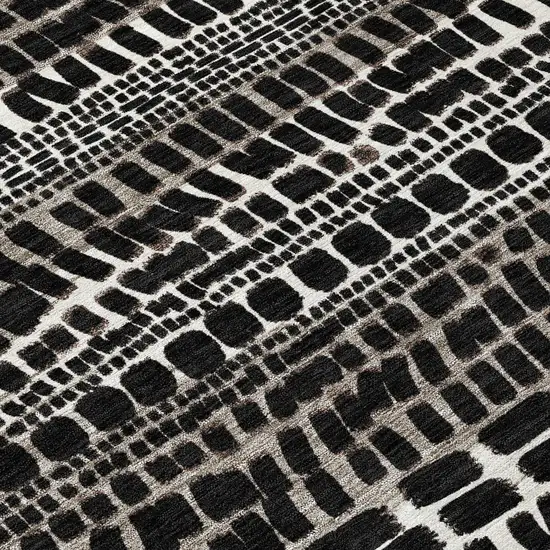 Black And Ivory Abstract Washable Indoor Outdoor Area Rug Photo 9