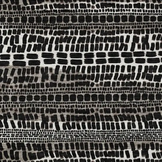 Black And Ivory Abstract Washable Indoor Outdoor Area Rug Photo 2