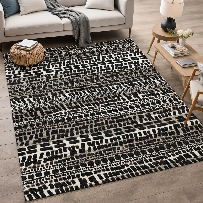 Black And Ivory Abstract Washable Indoor Outdoor Area Rug Photo 5