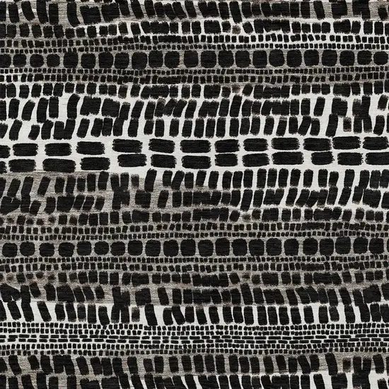 Black And Ivory Abstract Washable Indoor Outdoor Area Rug Photo 2