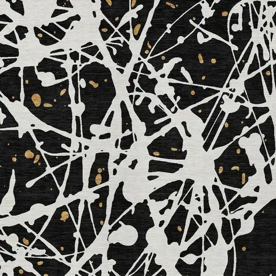 Black And Ivory Abstract Washable Indoor Outdoor Area Rug Photo 2