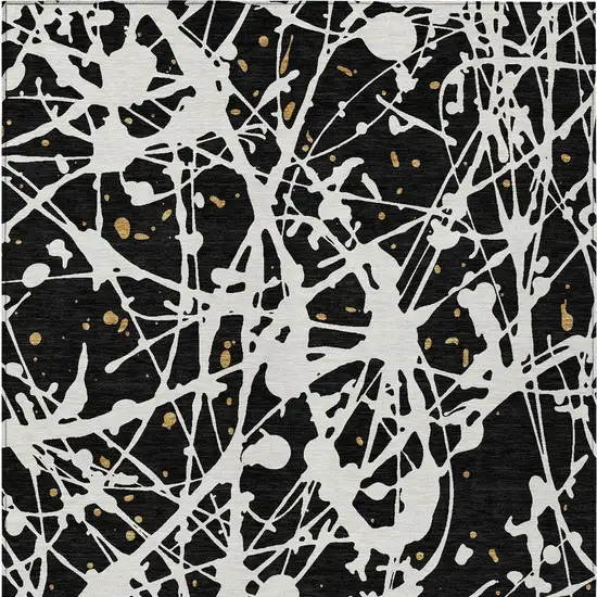 Black And Ivory Abstract Washable Indoor Outdoor Area Rug Photo 3