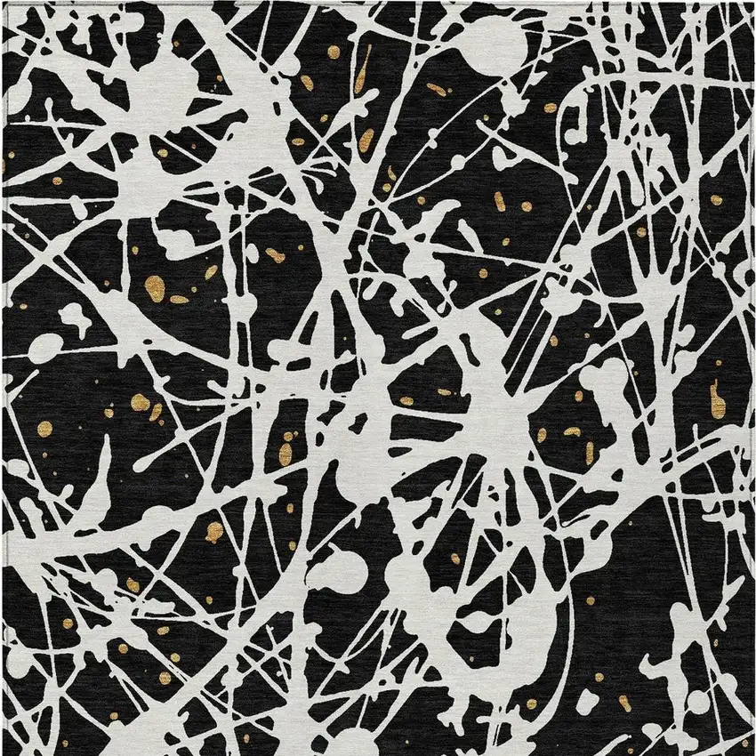 Black And Ivory Abstract Washable Indoor Outdoor Area Rug Photo 3