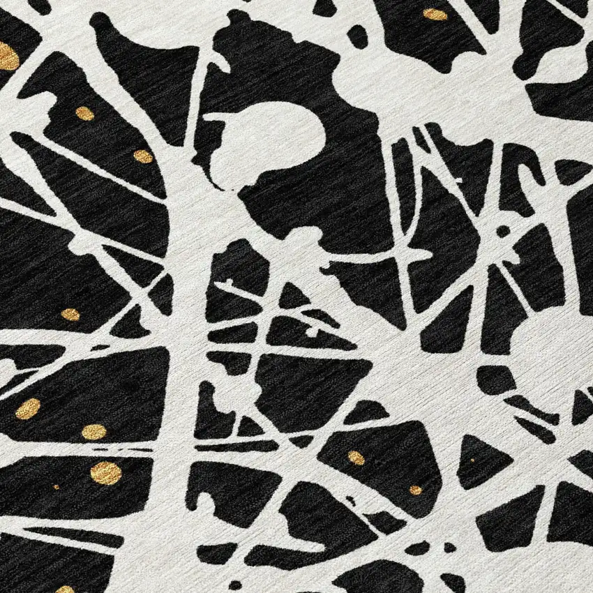 Black And Ivory Abstract Washable Indoor Outdoor Area Rug Photo 5
