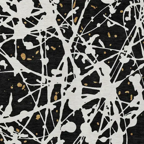 Black And Ivory Abstract Washable Indoor Outdoor Area Rug Photo 2