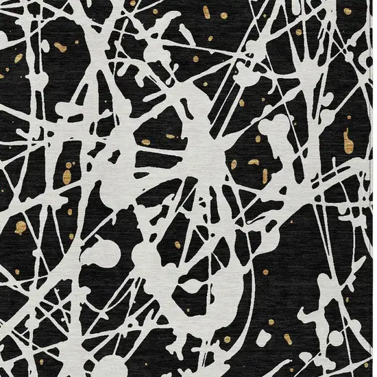 Black And Ivory Abstract Washable Indoor Outdoor Area Rug Photo 2