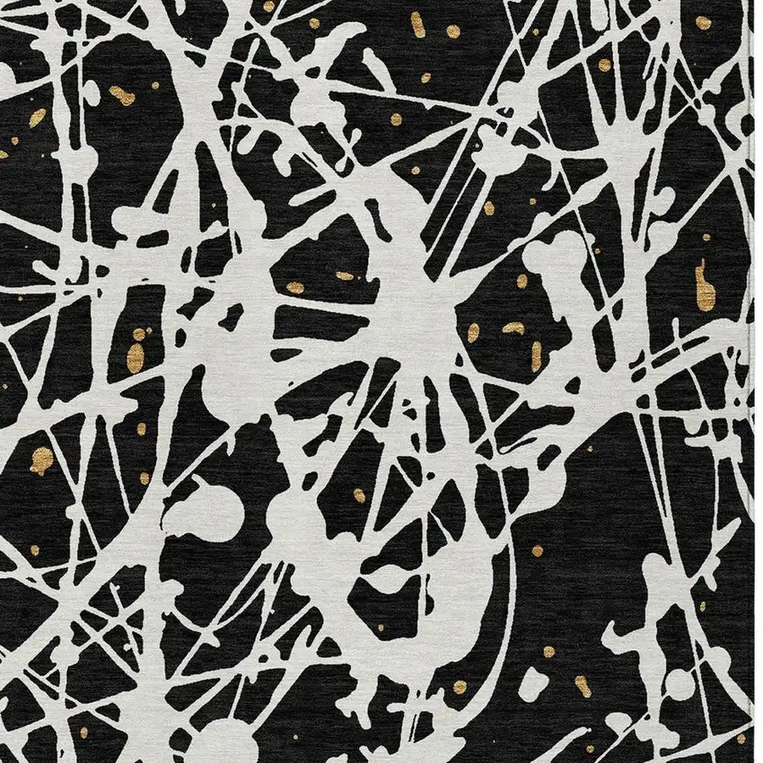 Black And Ivory Abstract Washable Indoor Outdoor Area Rug Photo 2