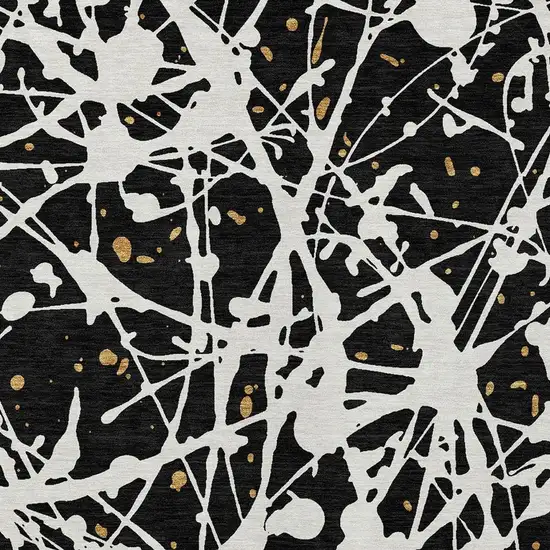 Black And Ivory Abstract Washable Indoor Outdoor Area Rug Photo 2