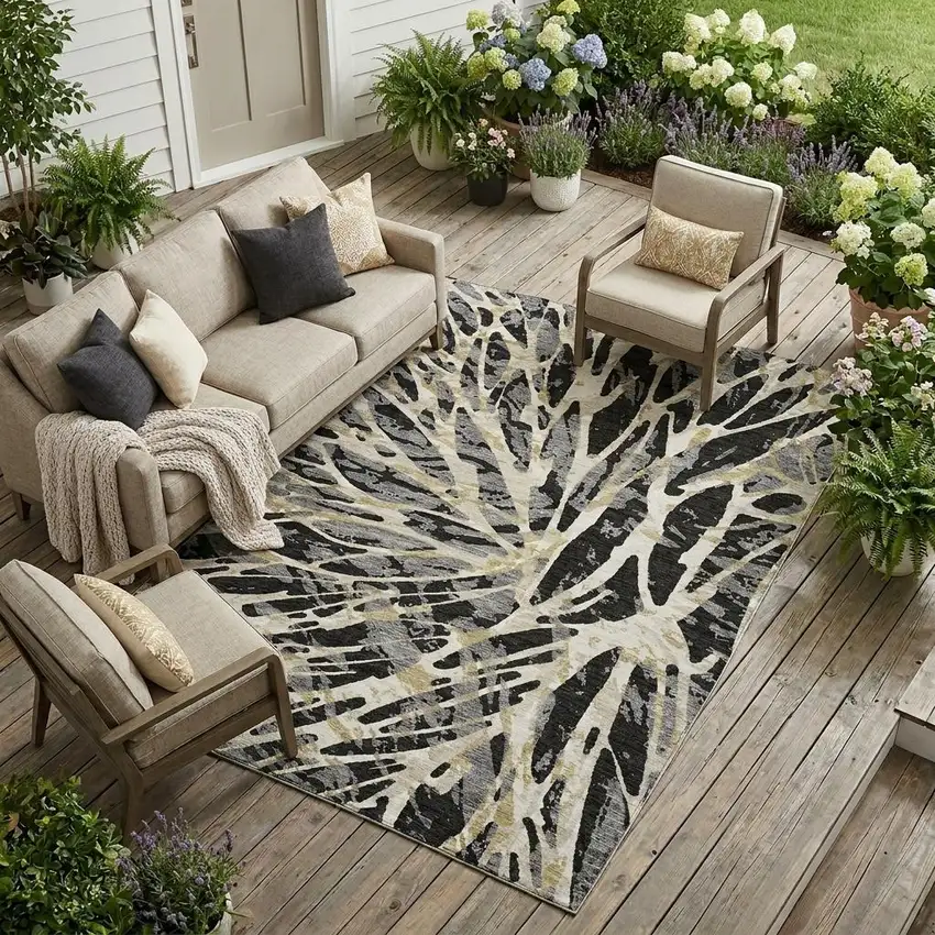 Black And Ivory Abstract Washable Indoor Outdoor Area Rug Photo 1
