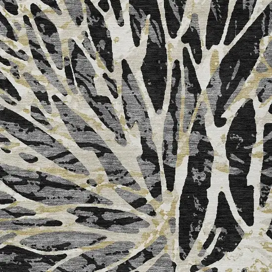 Black And Ivory Abstract Washable Indoor Outdoor Area Rug Photo 3