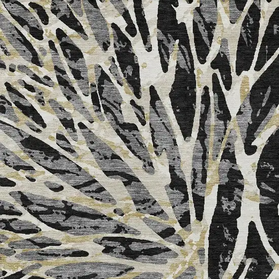 Black And Ivory Abstract Washable Indoor Outdoor Area Rug Photo 4
