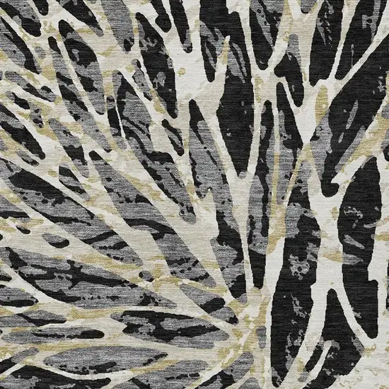 Black And Ivory Abstract Washable Indoor Outdoor Area Rug Photo 3