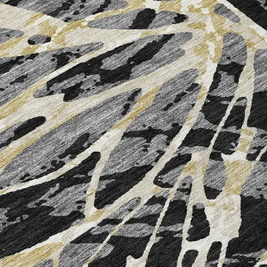 Black And Ivory Abstract Washable Indoor Outdoor Area Rug Photo 8