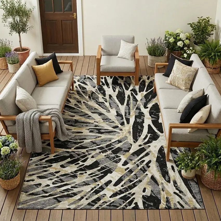 Black And Ivory Abstract Washable Indoor Outdoor Area Rug Photo 1