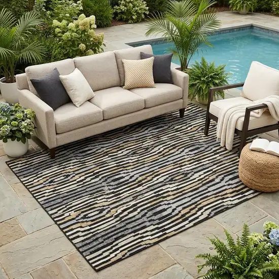 Black And Ivory Abstract Washable Indoor Outdoor Area Rug Photo 1