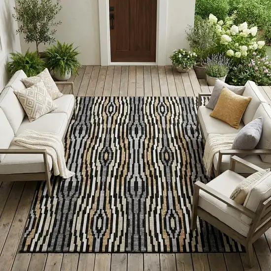 Black And Ivory Abstract Washable Indoor Outdoor Area Rug Photo 1