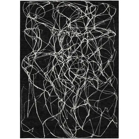Black And Ivory Abstract Washable Indoor Outdoor Area Rug Photo 4