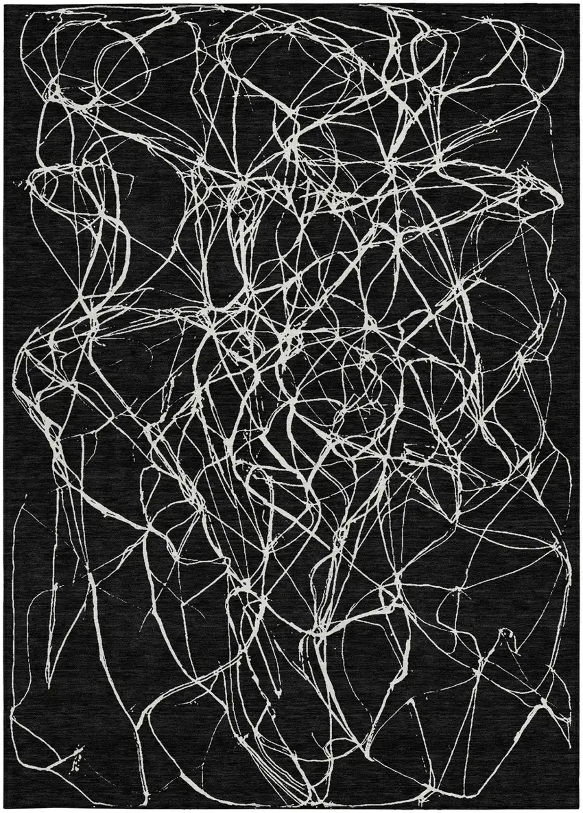 Black And Ivory Abstract Washable Indoor Outdoor Area Rug Photo 4