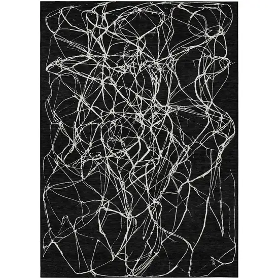 Black And Ivory Abstract Washable Indoor Outdoor Area Rug Photo 3
