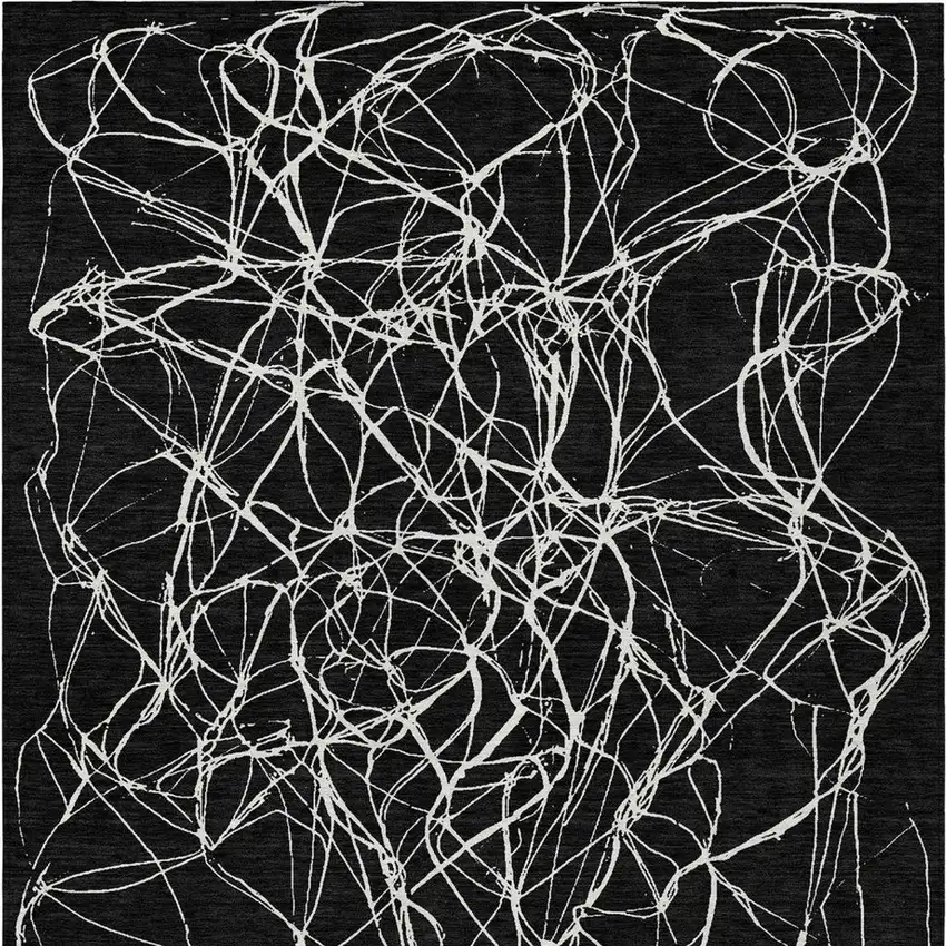 Black And Ivory Abstract Washable Indoor Outdoor Area Rug Photo 5