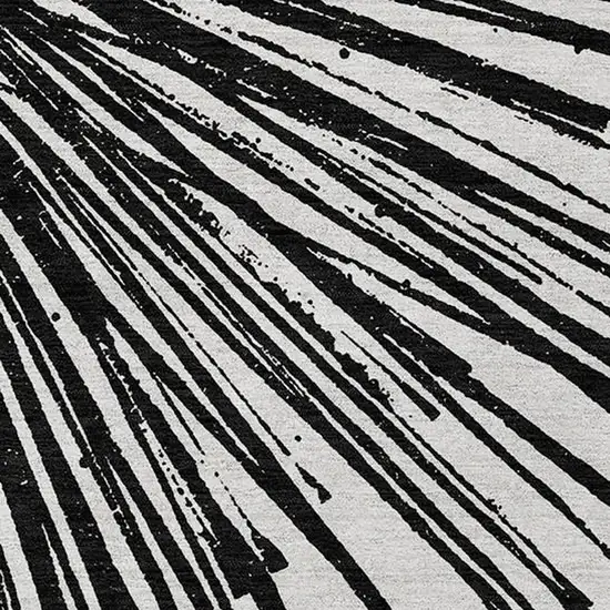 Black And Ivory Abstract Washable Indoor Outdoor Area Rug Photo 6