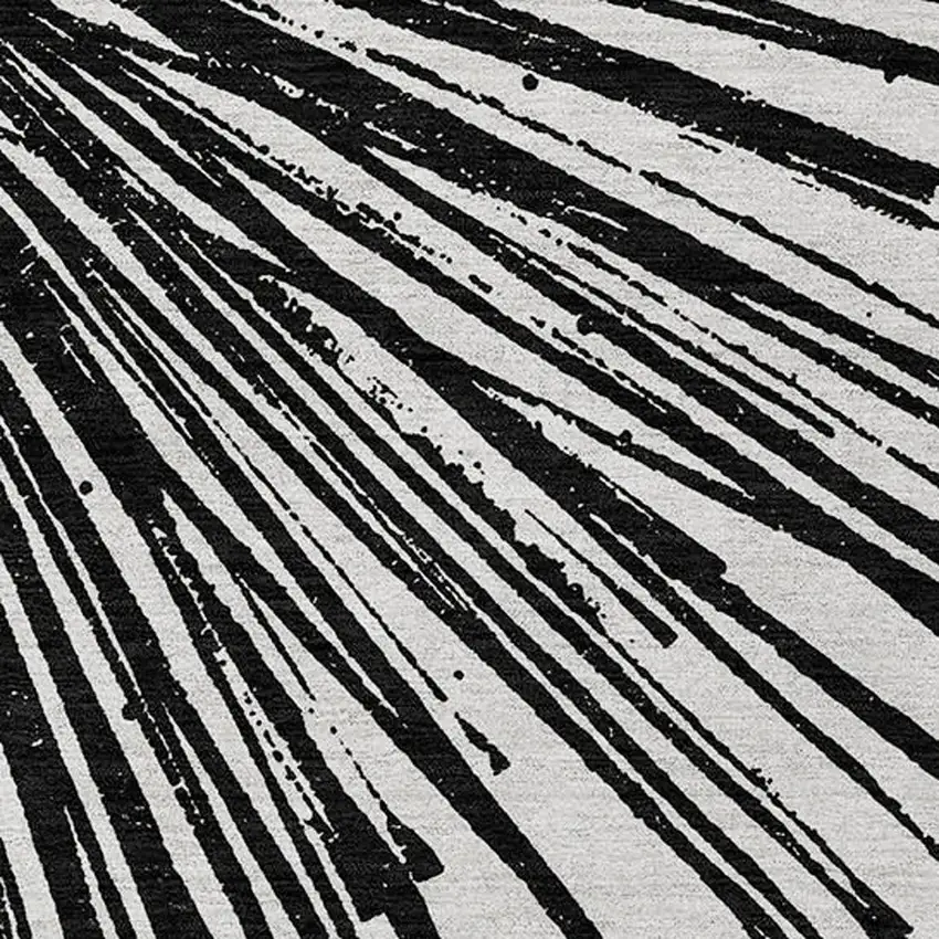 Black And Ivory Abstract Washable Indoor Outdoor Area Rug Photo 6
