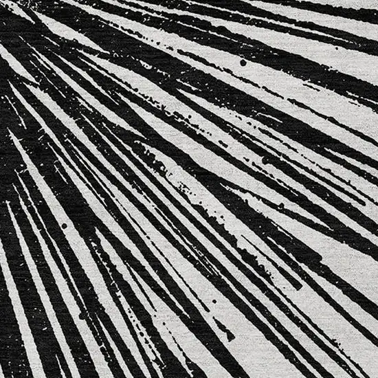 Black And Ivory Abstract Washable Indoor Outdoor Area Rug Photo 9