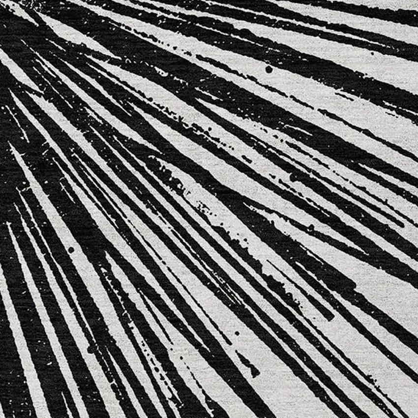 Black And Ivory Abstract Washable Indoor Outdoor Area Rug Photo 9