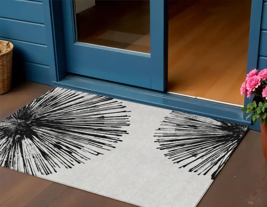 Black And Ivory Abstract Washable Indoor Outdoor Area Rug Photo 2