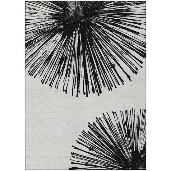 Black And Ivory Abstract Washable Indoor Outdoor Area Rug Photo 3